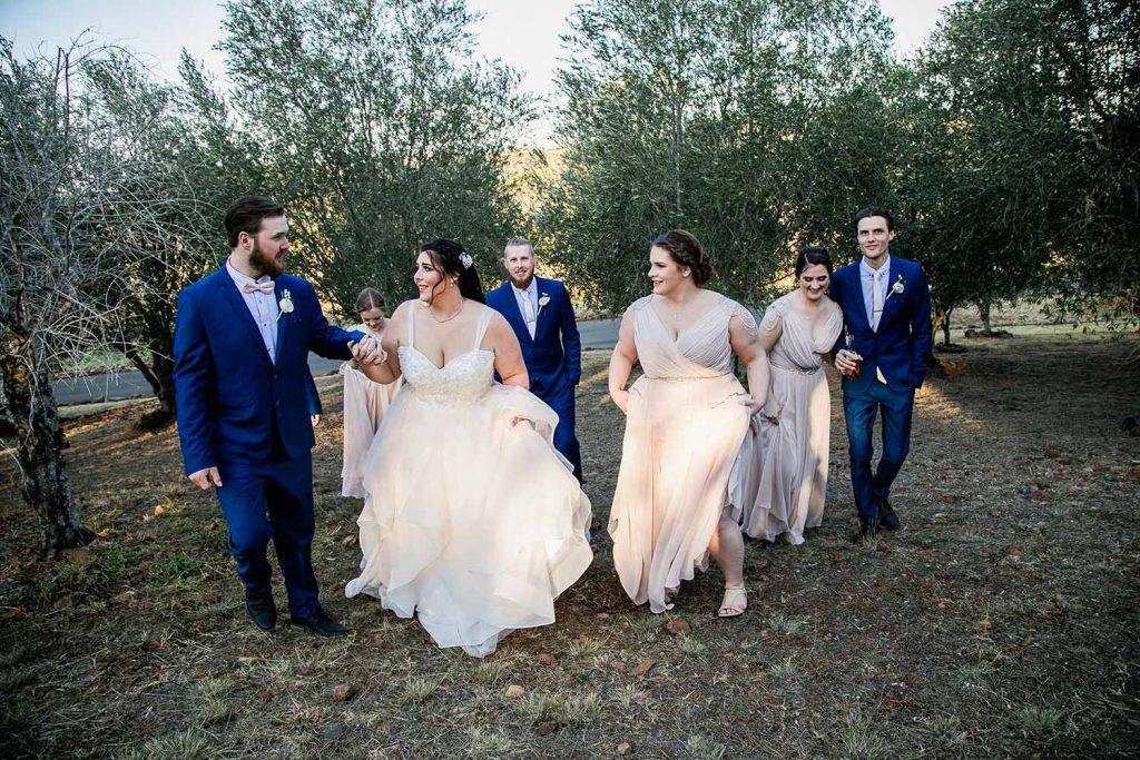 Wedding Photography - bridal party walking