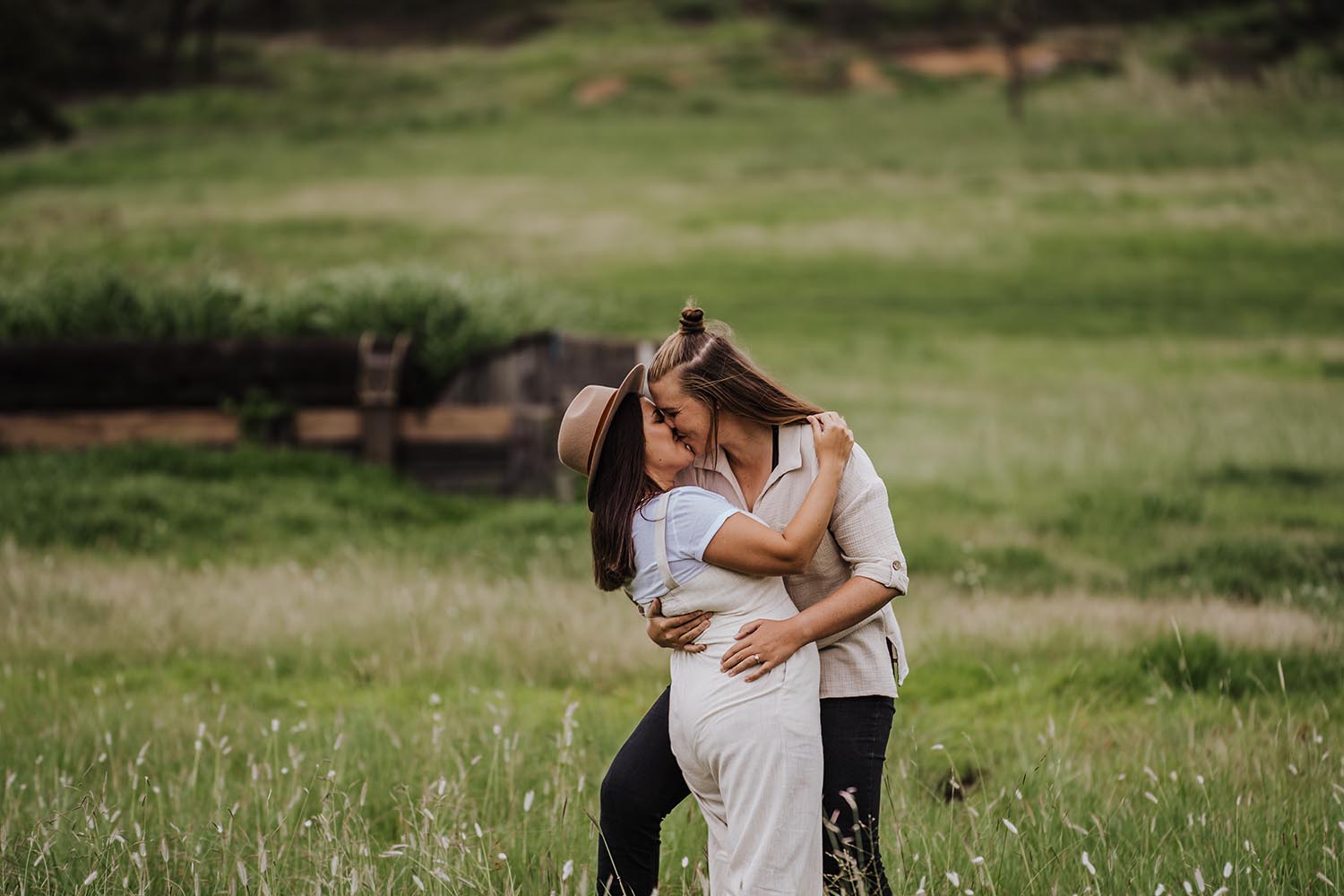 Engagement Photography - kisses in field