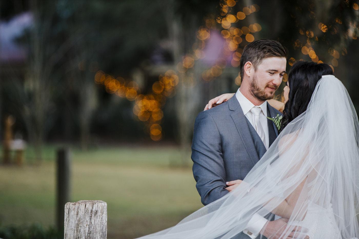 Wedding Photography Toowoomba couple embracing under lights