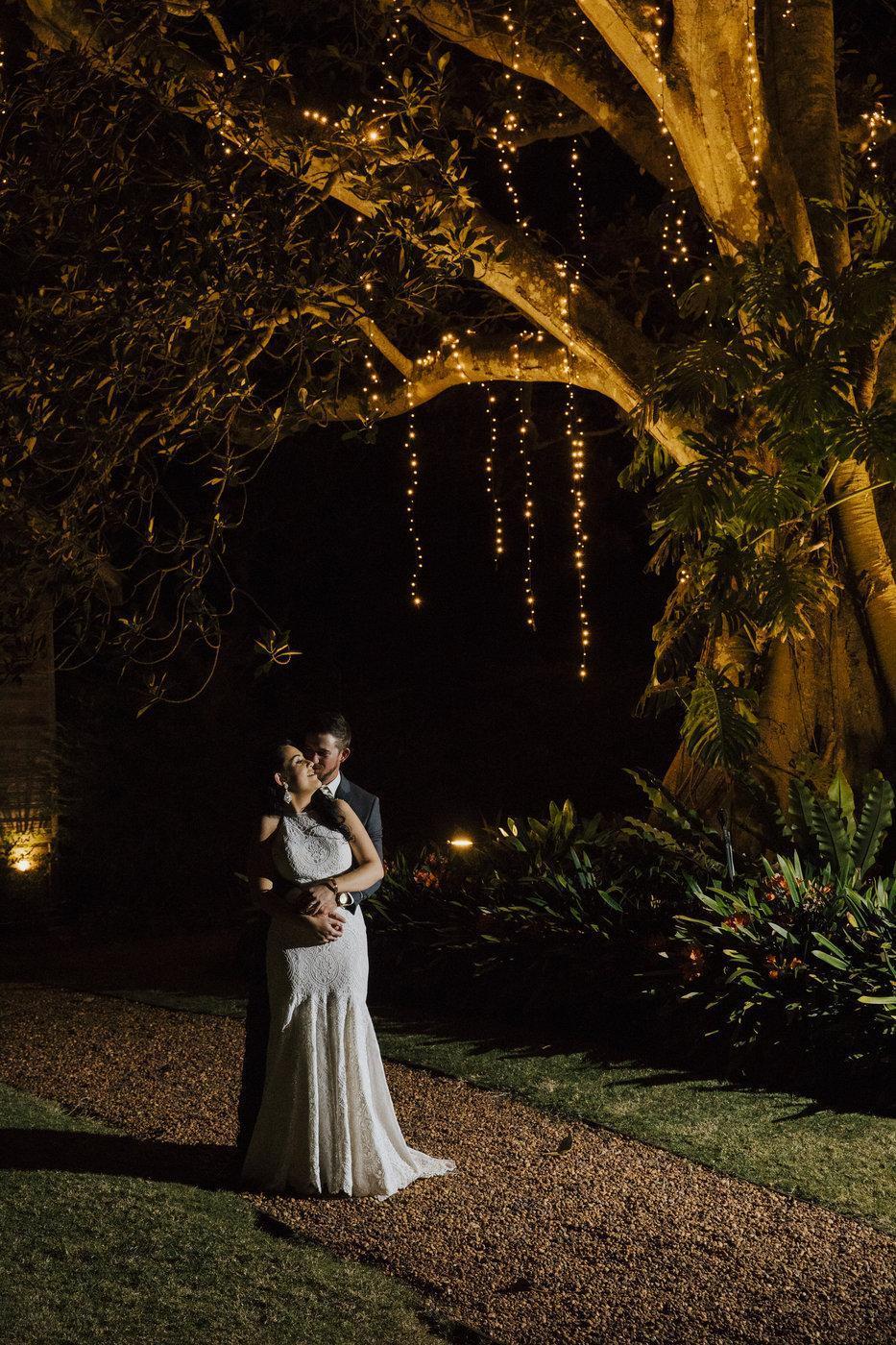 Wedding Photography - reception couple under tree at night