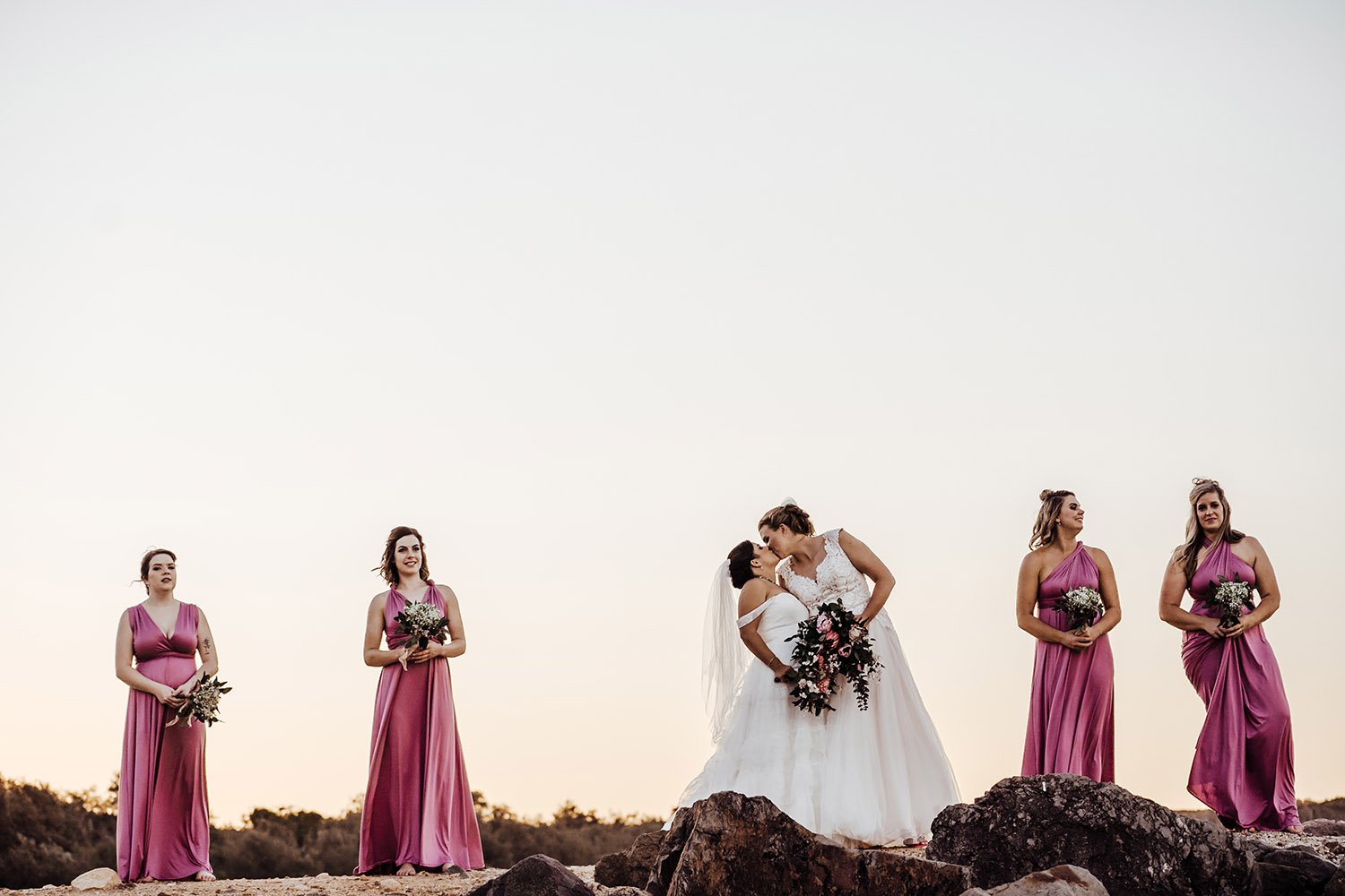 Wedding Photography - Bridal party on the rocks at the beach