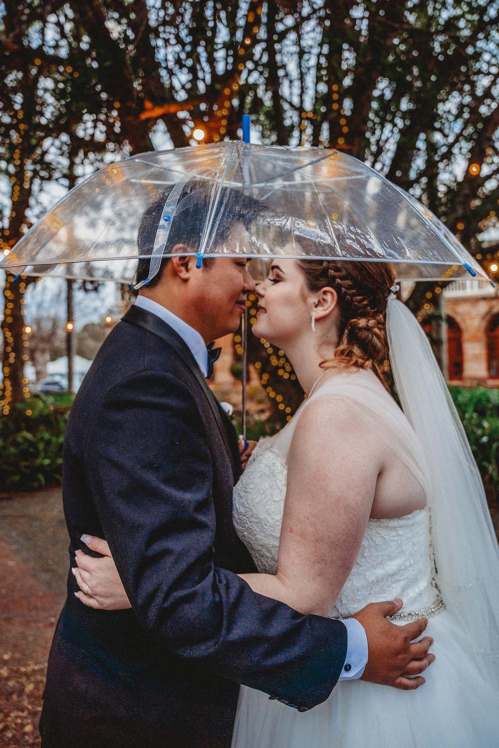 Wedding Photography - Couple under umbrella