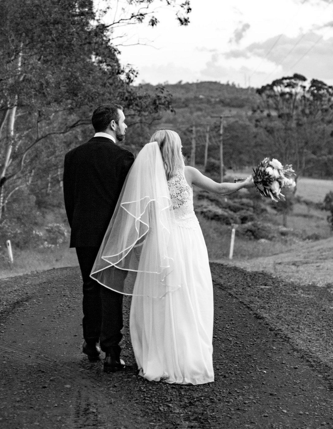 Wedding Photography couple walking away black and white