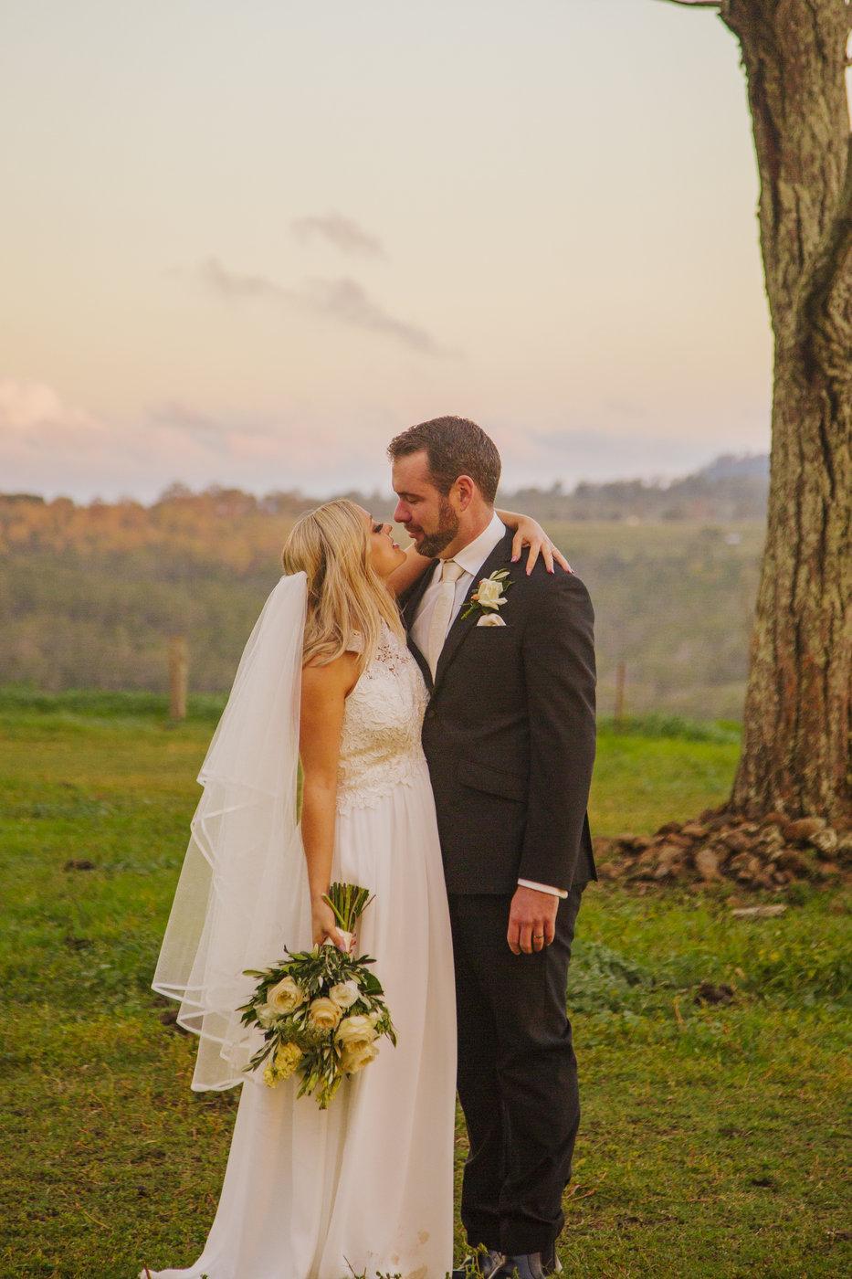 Wedding Photography husband and wife embracing