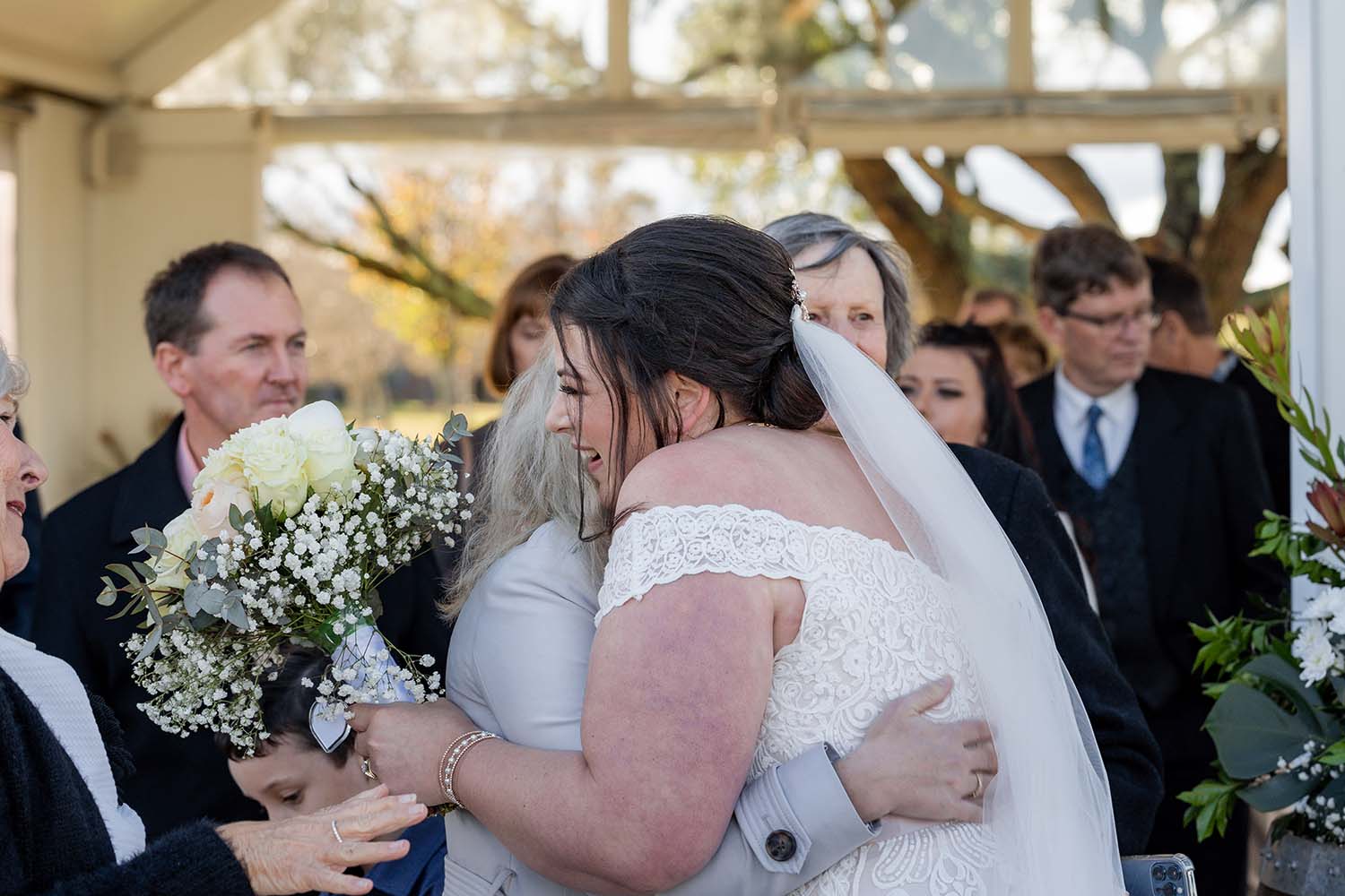 Wedding Photography - congratulation hugs