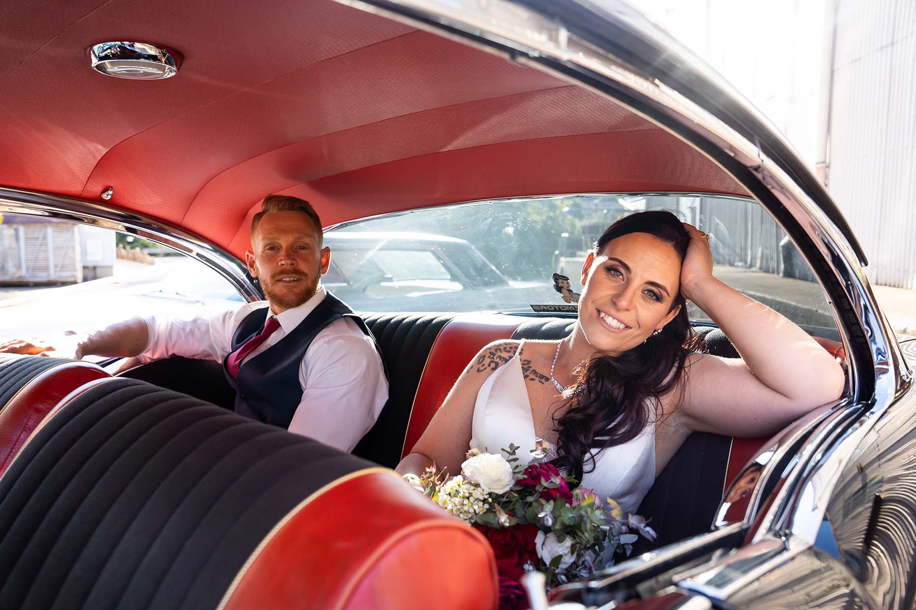 Wedding Photography - Bride and Groom in car