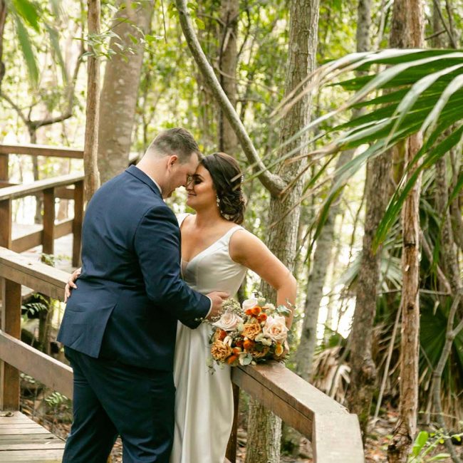 Wedding Photography - bride and groom on bridge