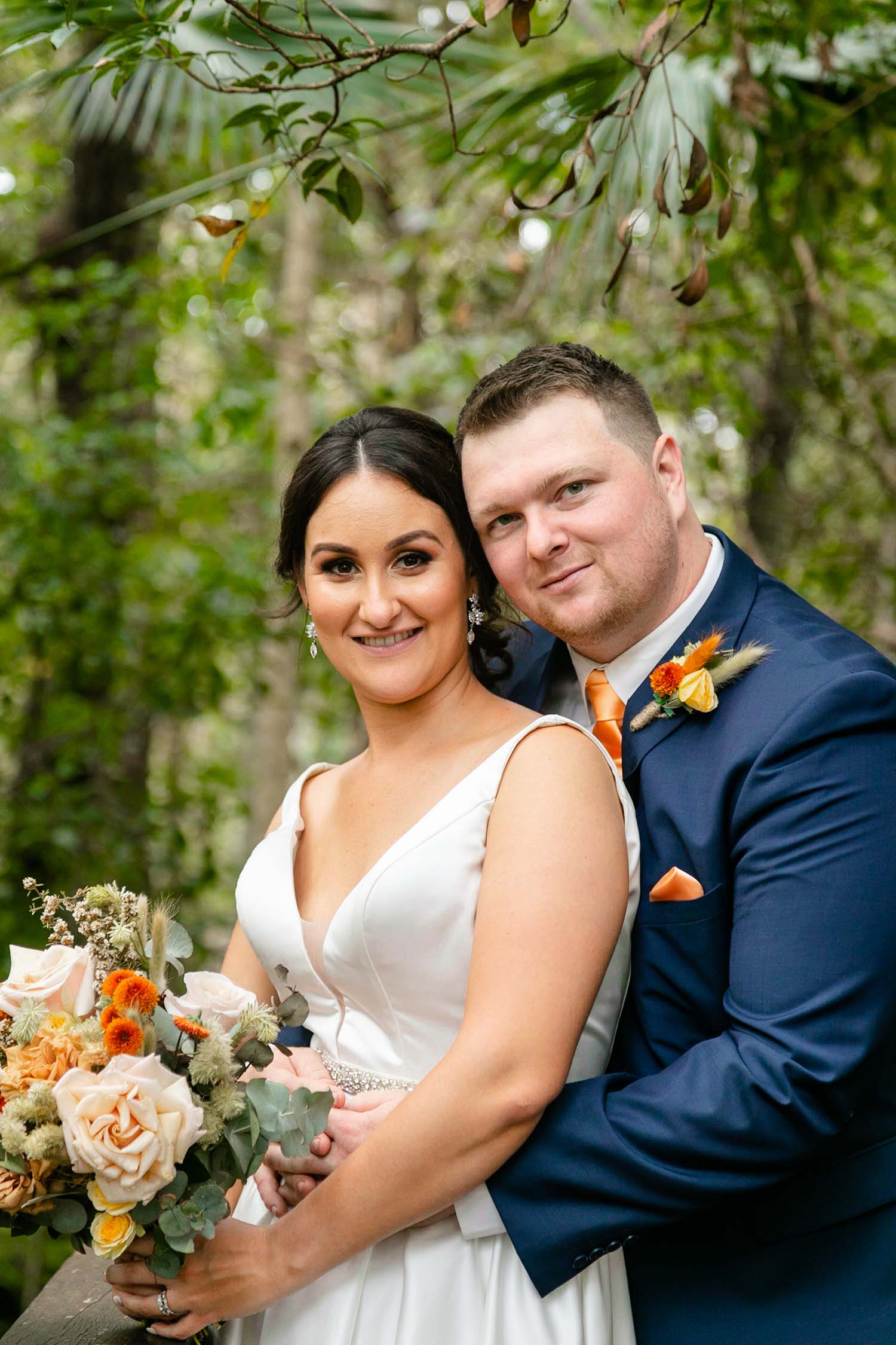 Wedding Photography - groom holding bride