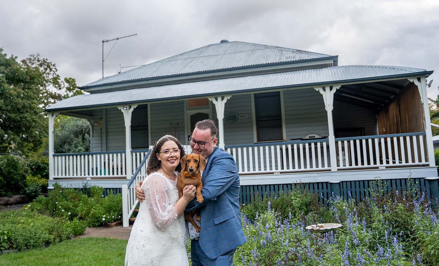 Wedding Photography - Bride and Groom in front of house