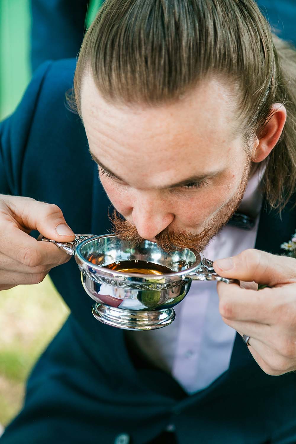 Wedding Photography - Groom drinking from Quaich