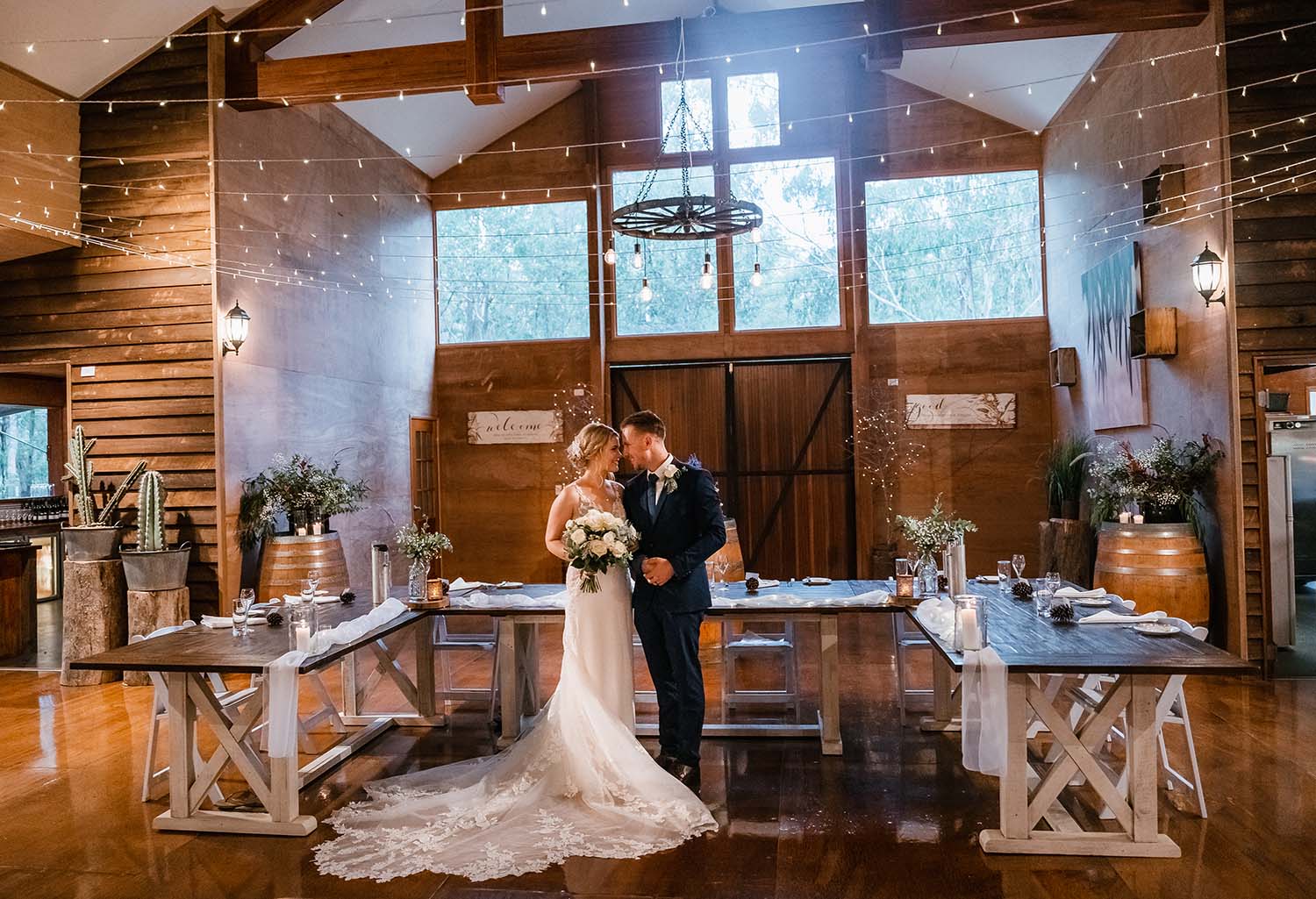 Wedding Photography - bride and groom in rustic barn