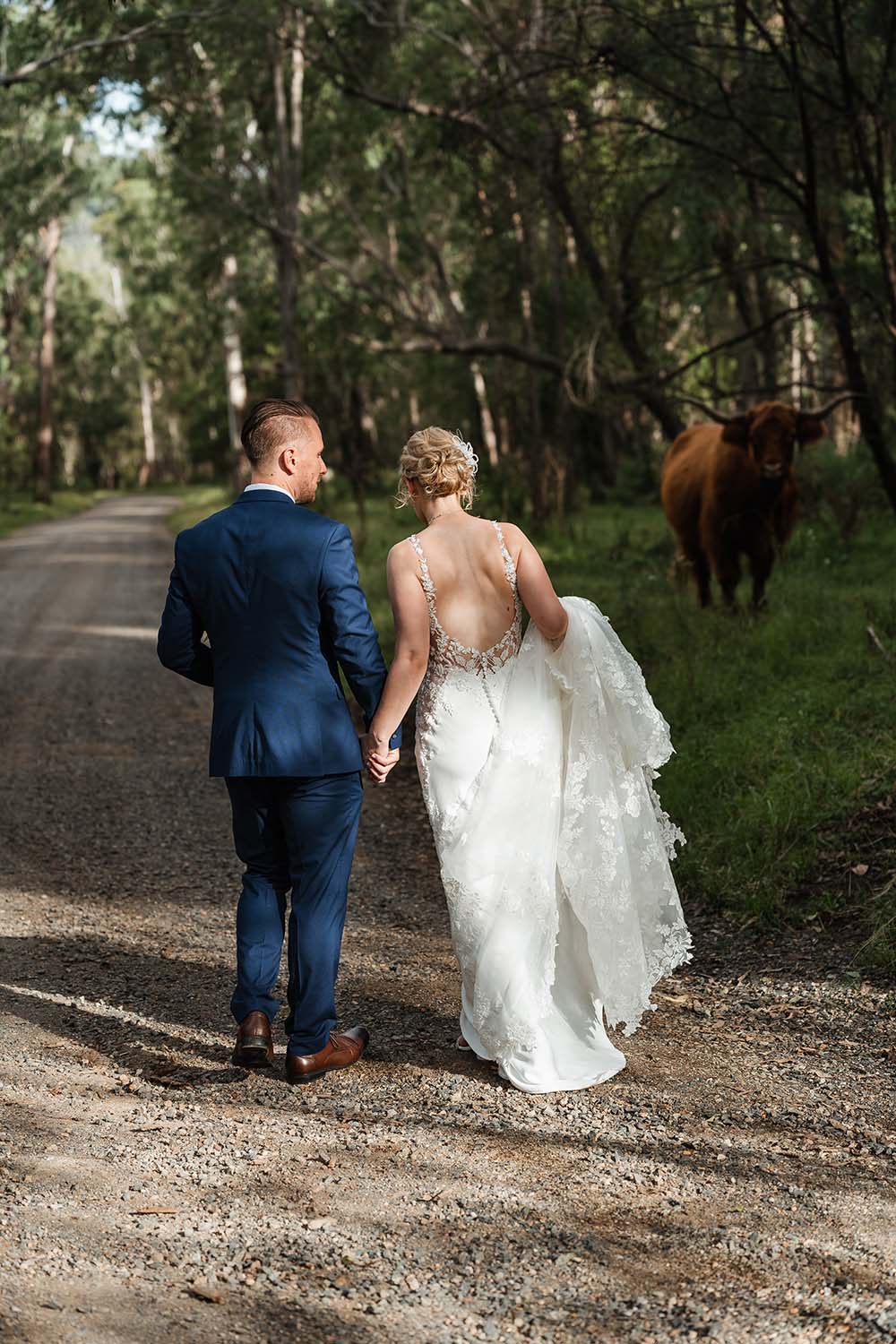 Wedding Photography - couple walking away