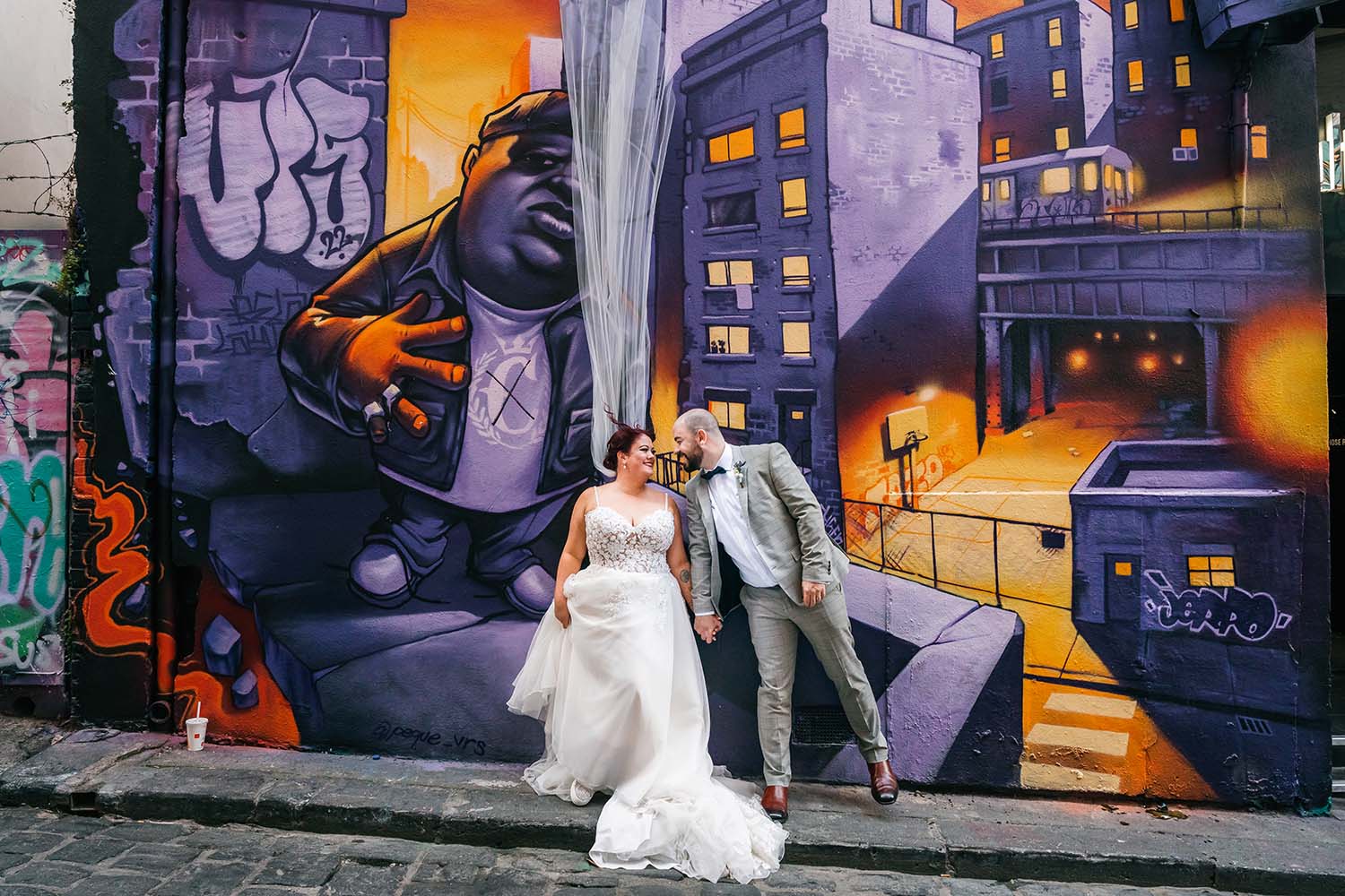 Destination Wedding Photography - Bride and Groom in front of Street Graffiti