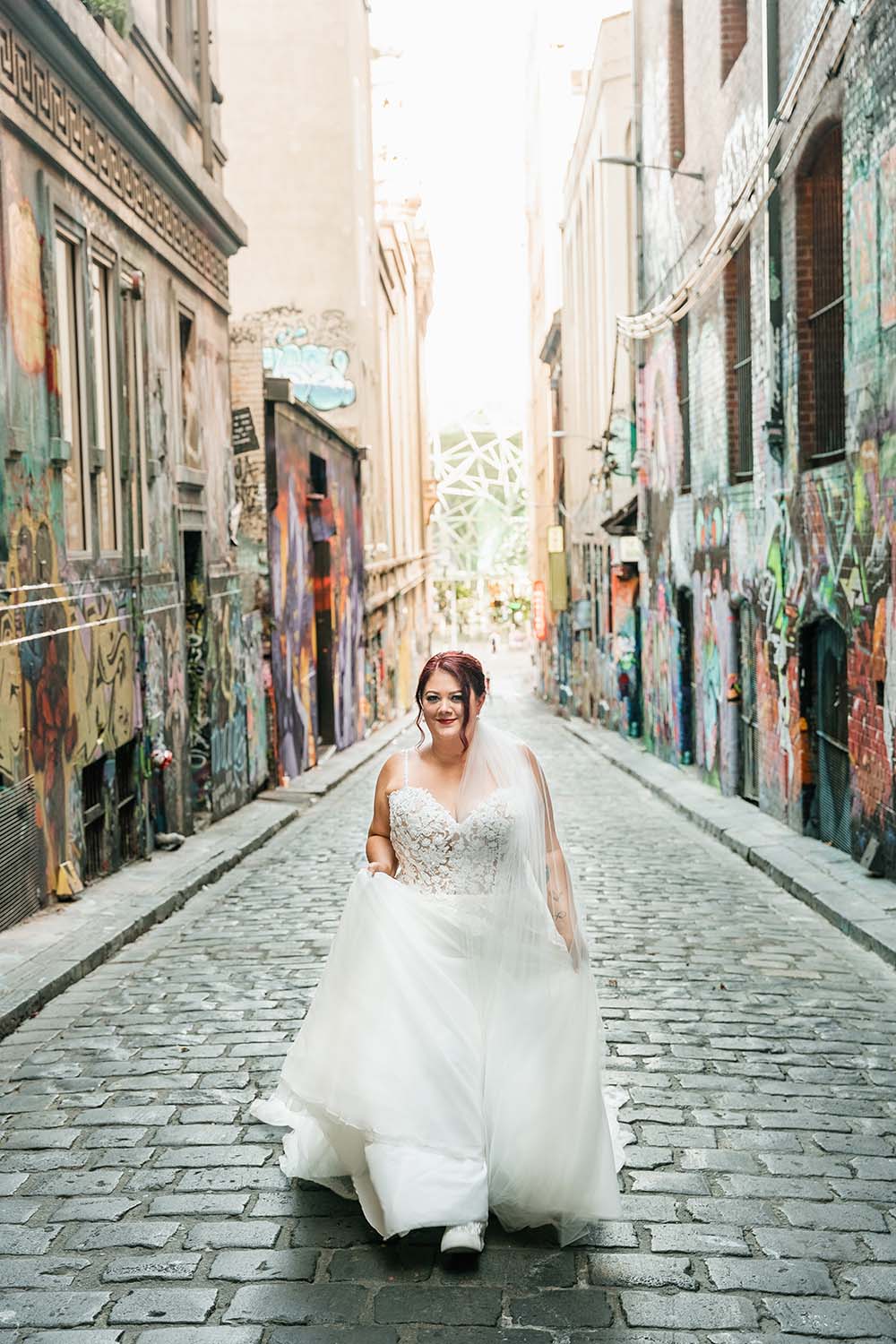 Destination Wedding Photography - Bride walking down alley
