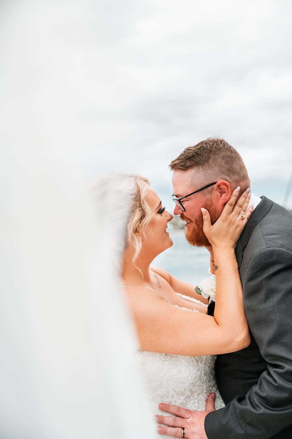 Wedding Photography - Bride holding Groom