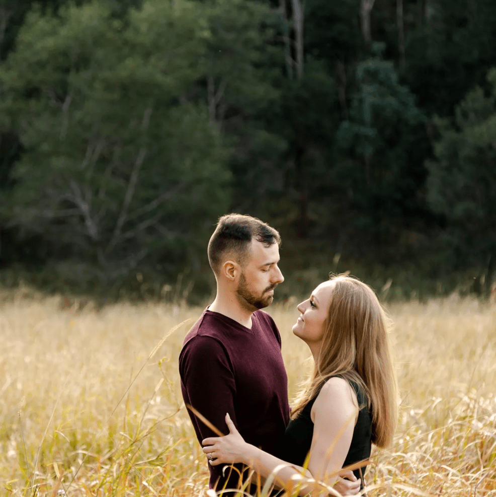 Engagement Photography - Couple in grassy field