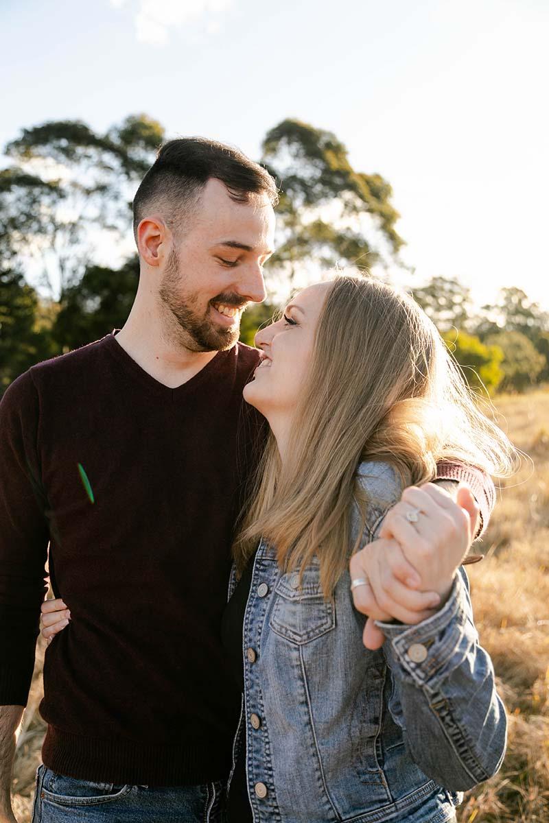Engagement Photography - Couple smiling at eachother