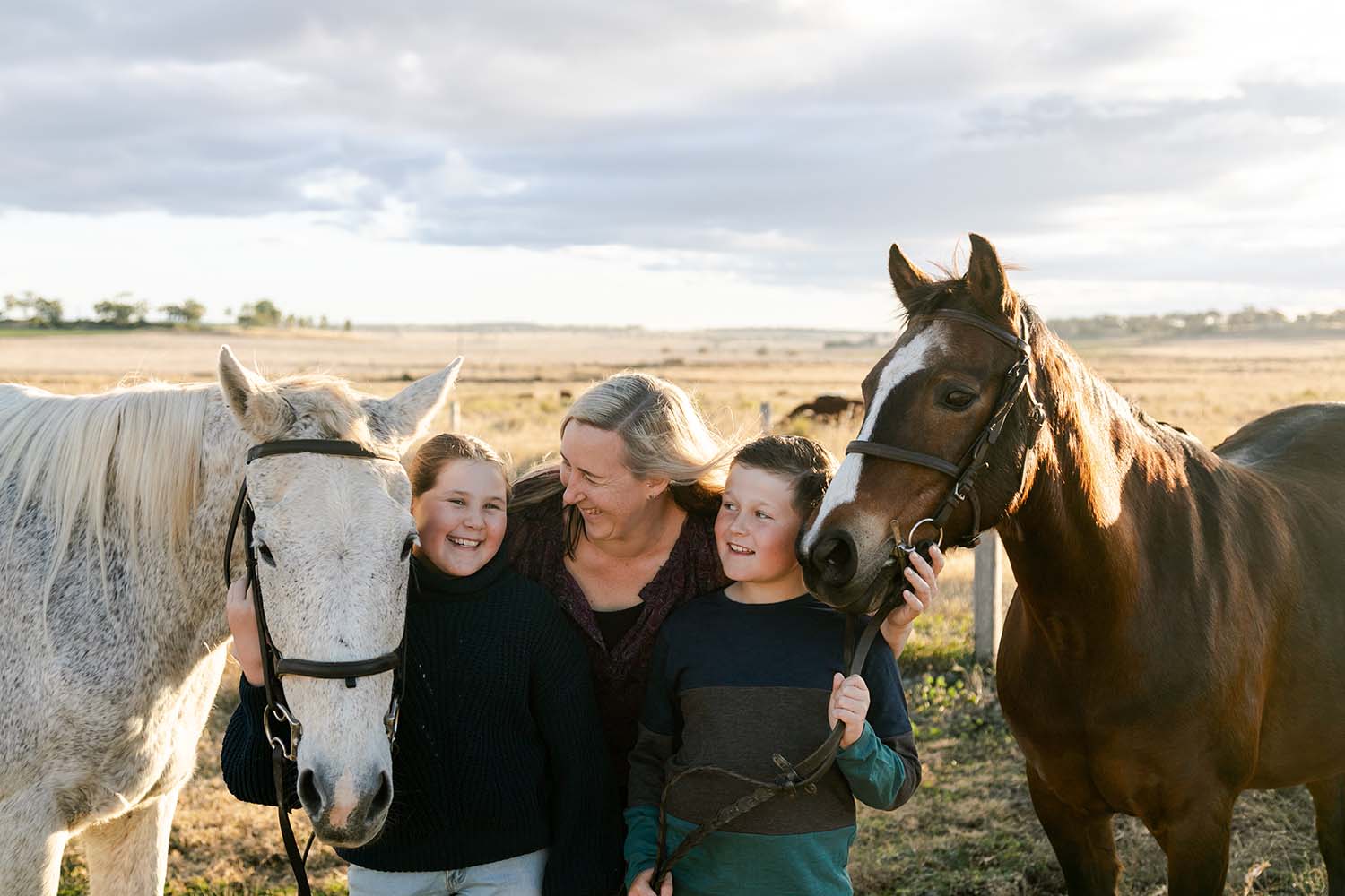 Family Photography Toowoomba - Cuddling horses