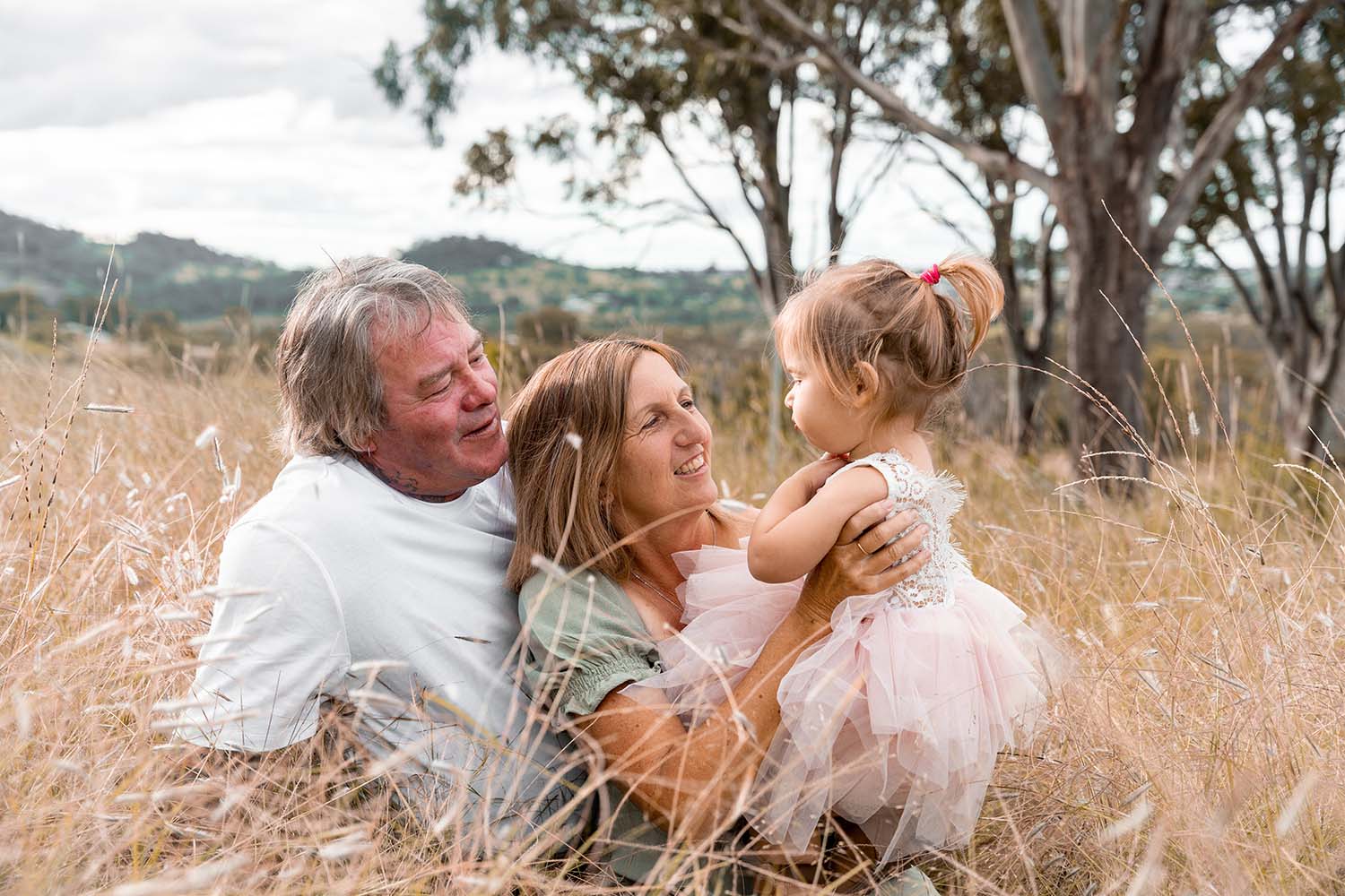 Family Photography Toowoomba - couple holding daughter