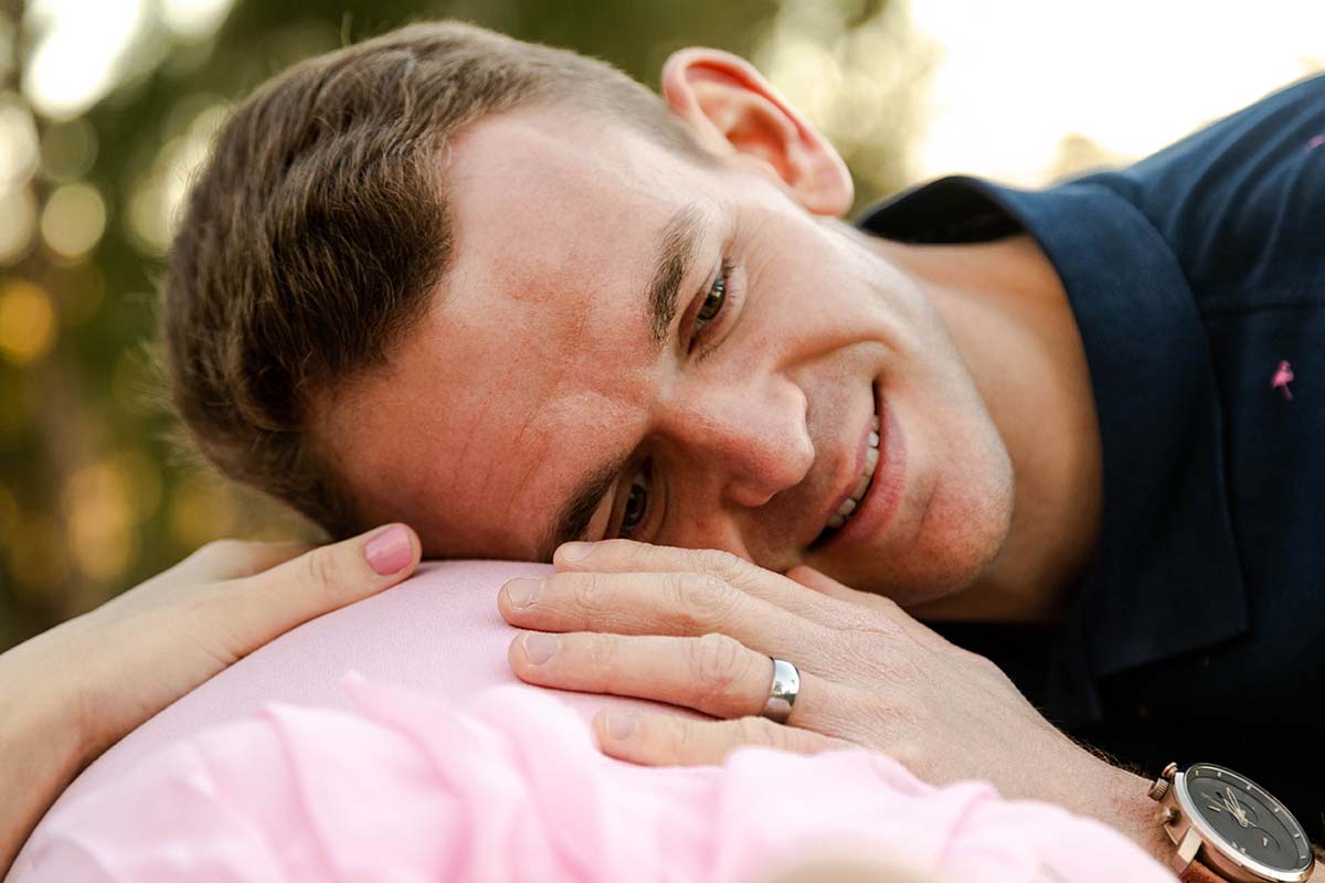 Maternity Shoot Photography - Fathers head resting gently on baby bump