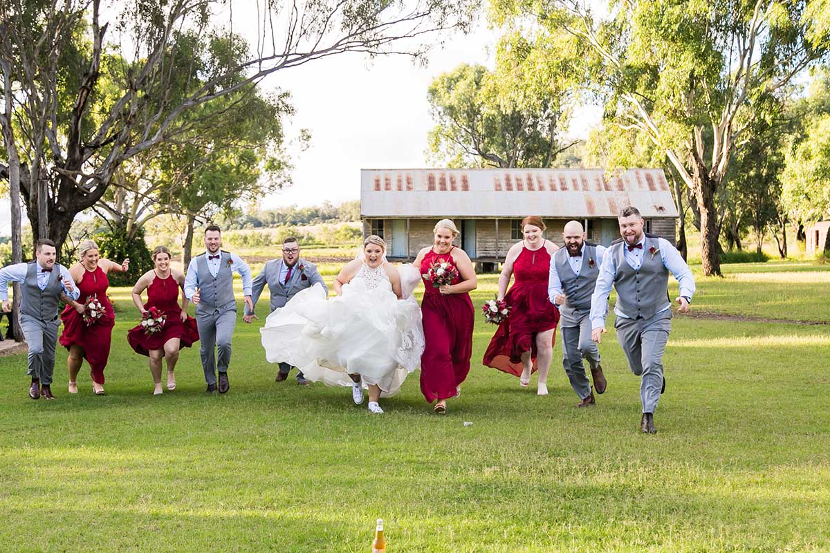 Wedding Photography - Bridal Party running