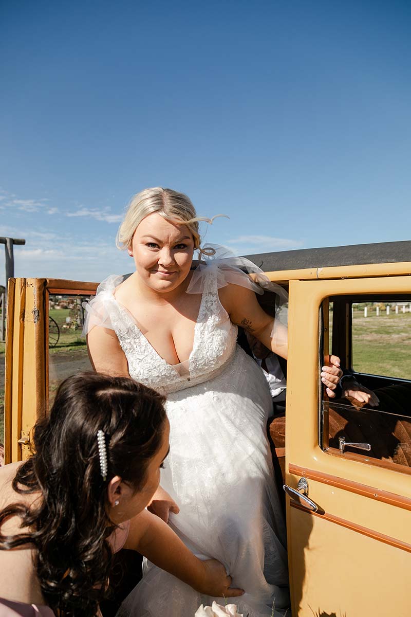 Wedding Photography - Bride exiting car