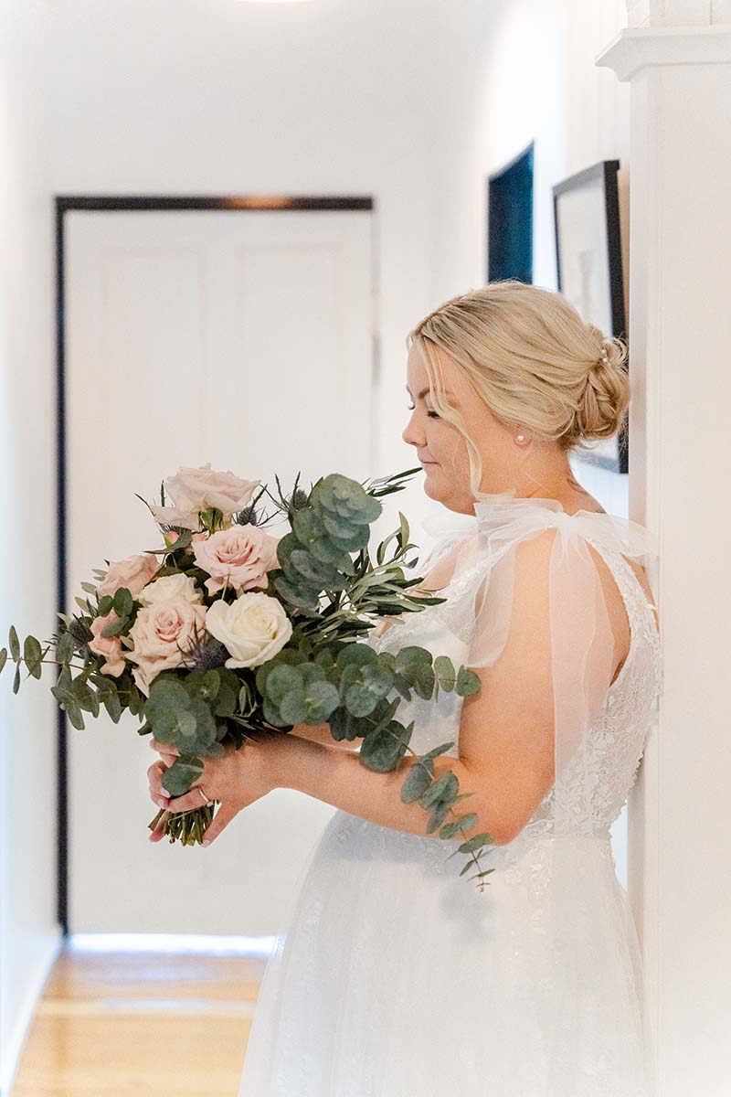 Wedding Photography - bride holding flowers