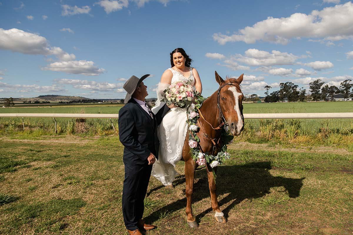 Wedding Photography - bride riding horse