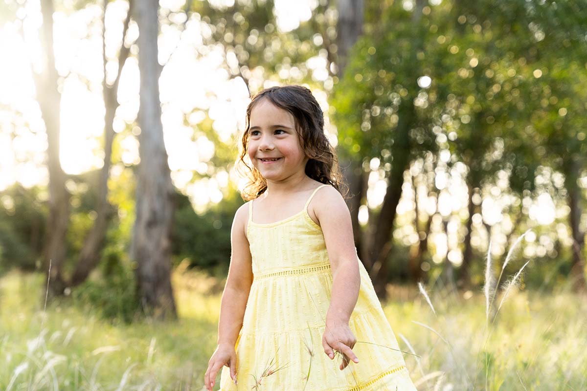 Family Photography - young girl in field