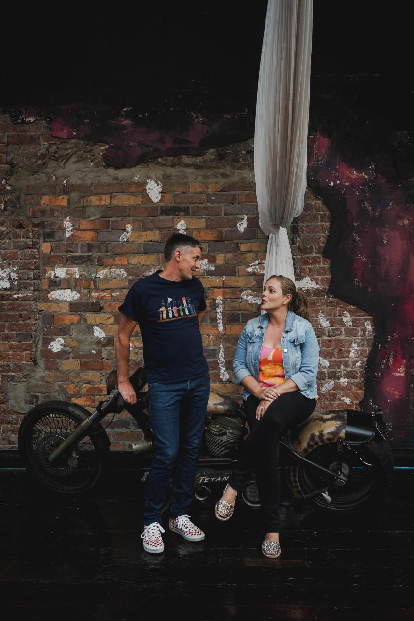 Enagagement Photography - Smoked Garage BNE - Couple sitting on Motorcycle