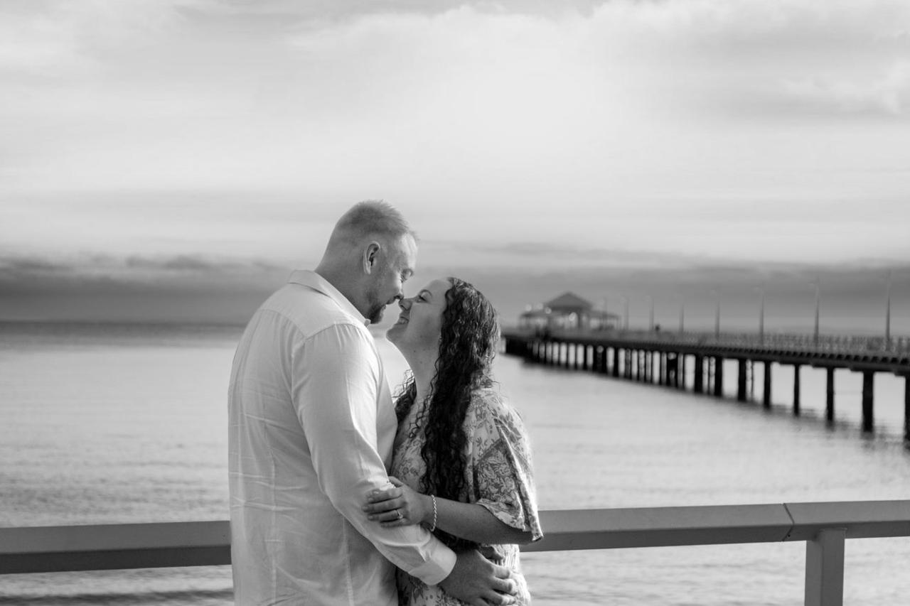 Engagement Photography - Sunrise Shorncliffe Pier - Embracing at Pier Black and white
