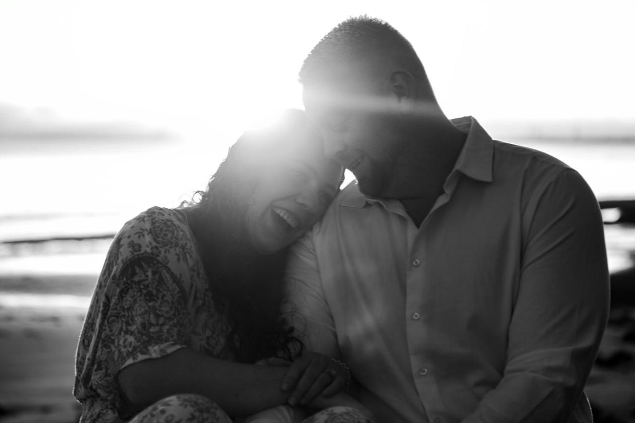 Engagement Photography - Sunrise Shorncliffe Pier - couple holding eachother