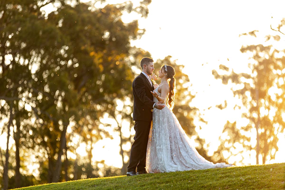 Wedding Photography - bride and groom embracing at sunset