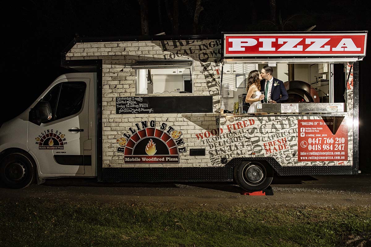 Wedding Photography - bride and groom in pizza van