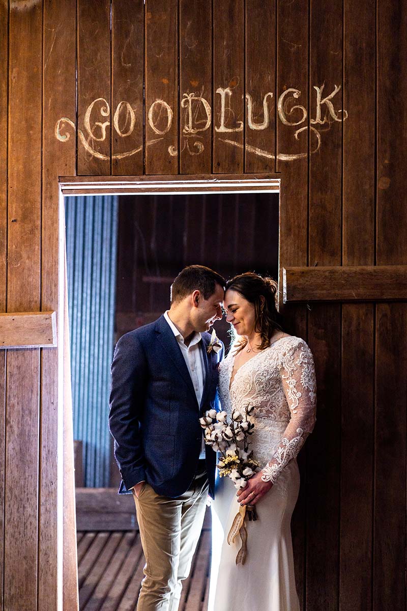 Wedding Photography - bride and groom in rustic shed