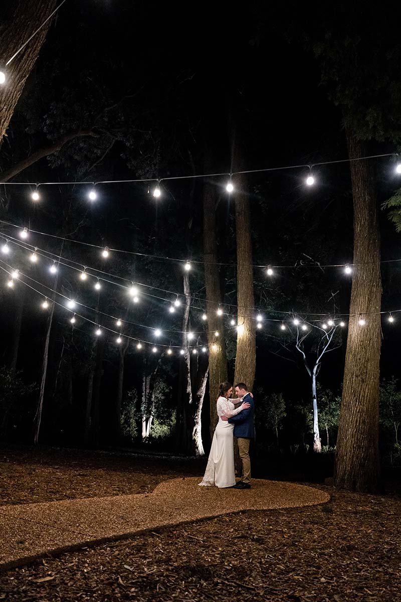 Wedding Photography - bride and groom under fairy lights