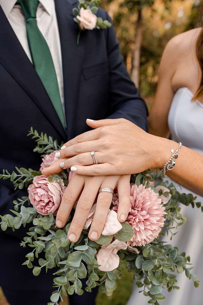 Wedding Photography – close up of bride and grooms hands