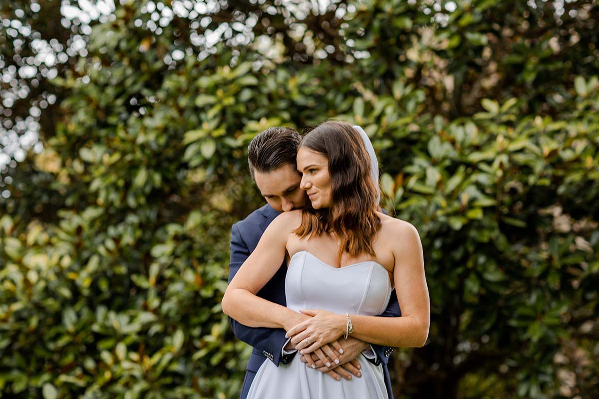 Wedding Photography – groom holding bride