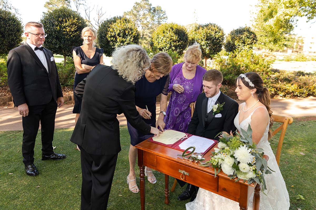 Wedding Photography - signing the marriage certificate