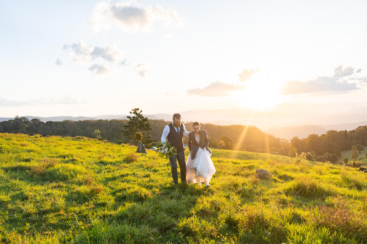 Lewis & Patricia O'Reillys Rainforest retreat Elopement - Bride and Groom in field