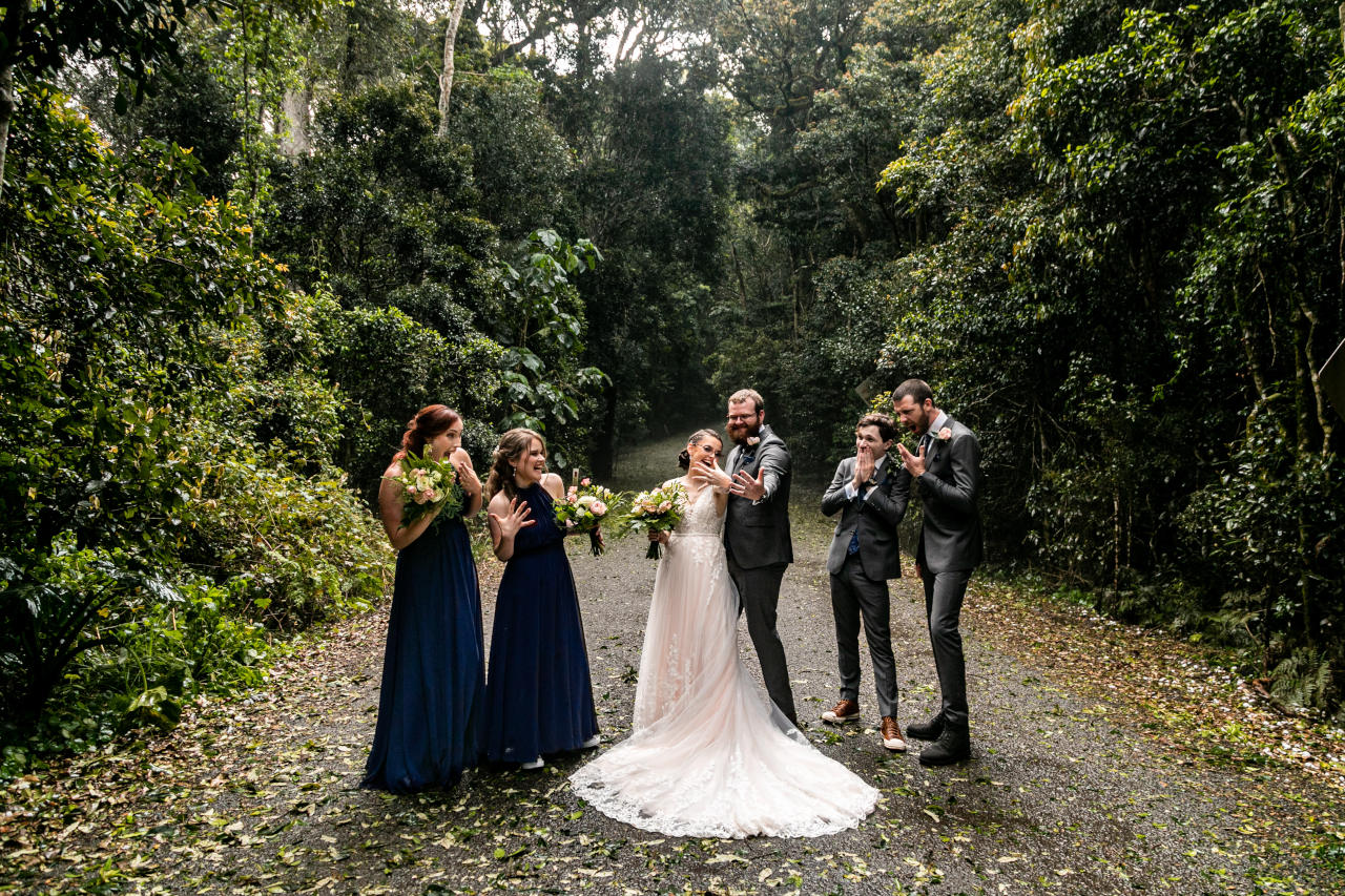 Lewis & Patricia O'Reillys Rainforest retreat Elopement - Newly wed showing off marriage rings