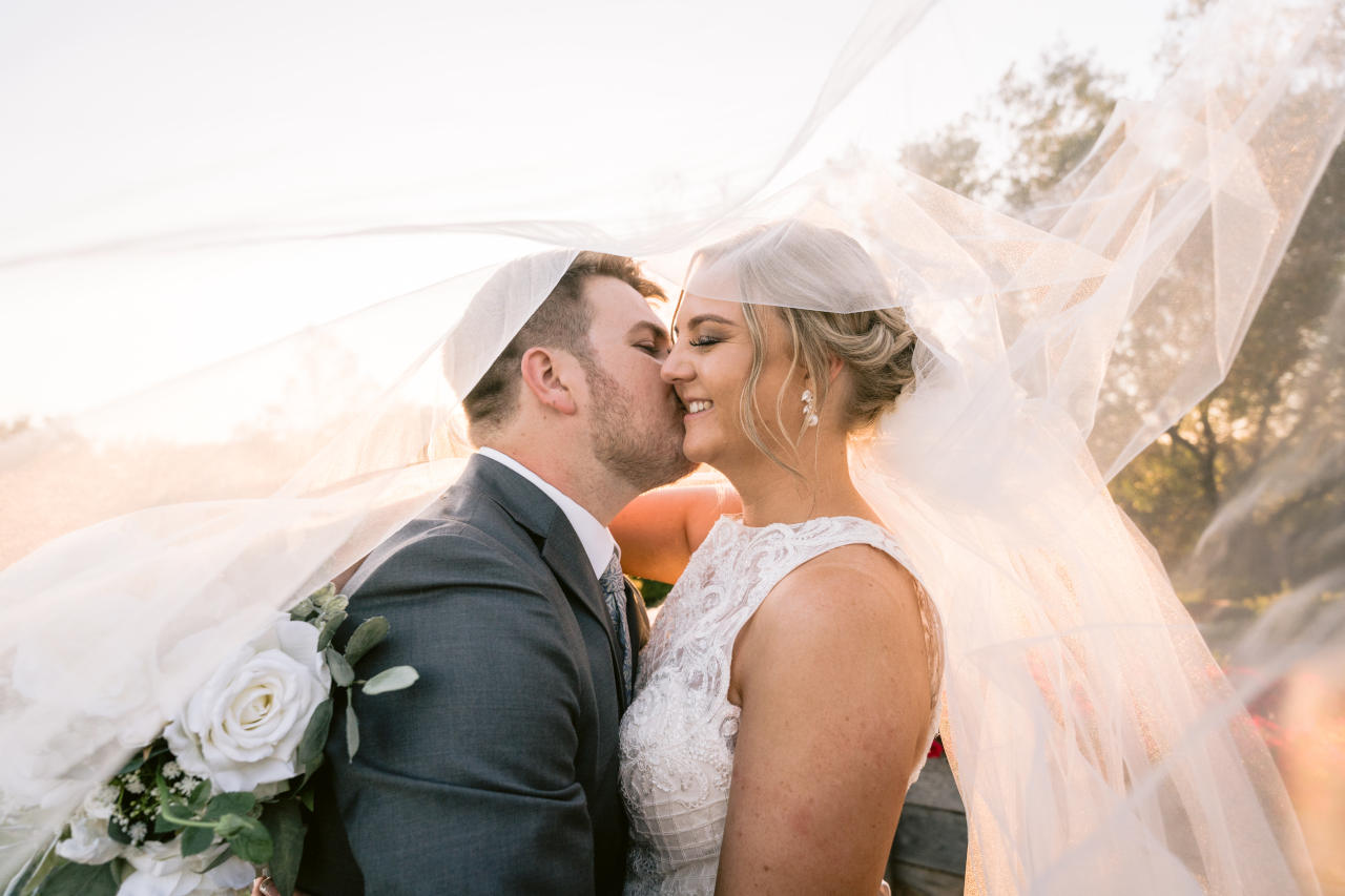 Preston Peak Wedding - bride and groom kissing