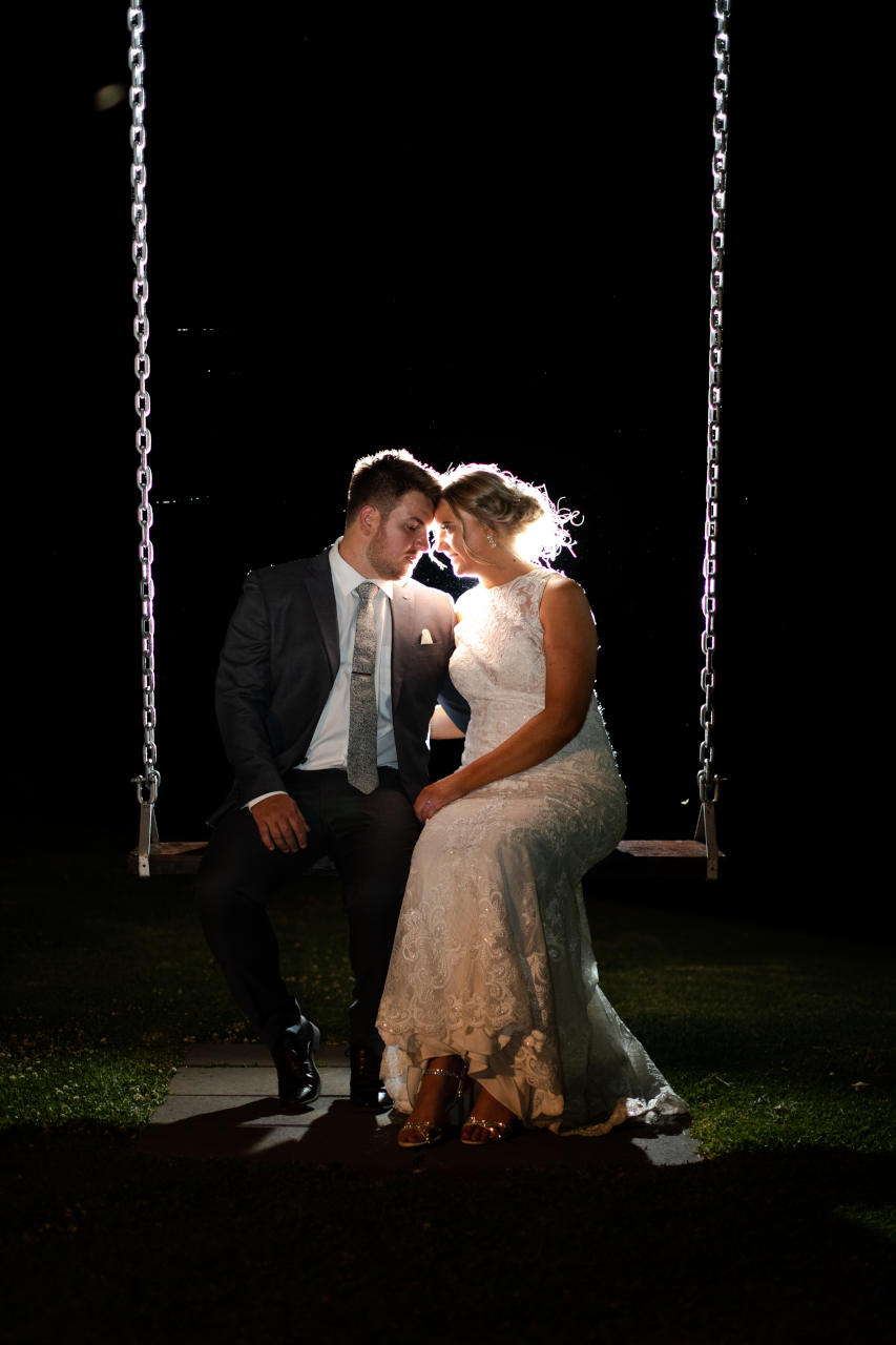 Preston Peak Wedding - bride and groom on swing