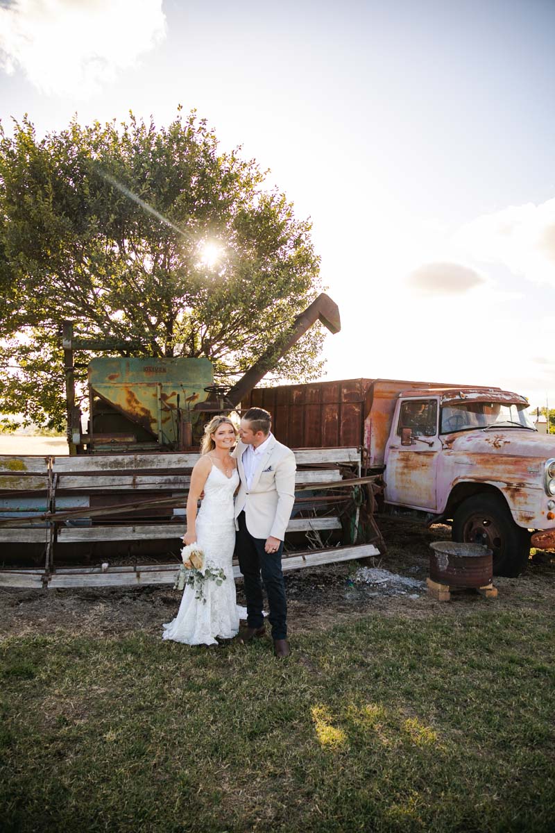 Wedding Photography bride and groom in front of rustic truck