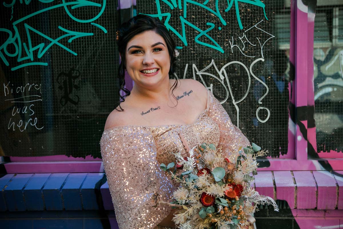 Wedding Photography Elopment bride in front of graffiti wall