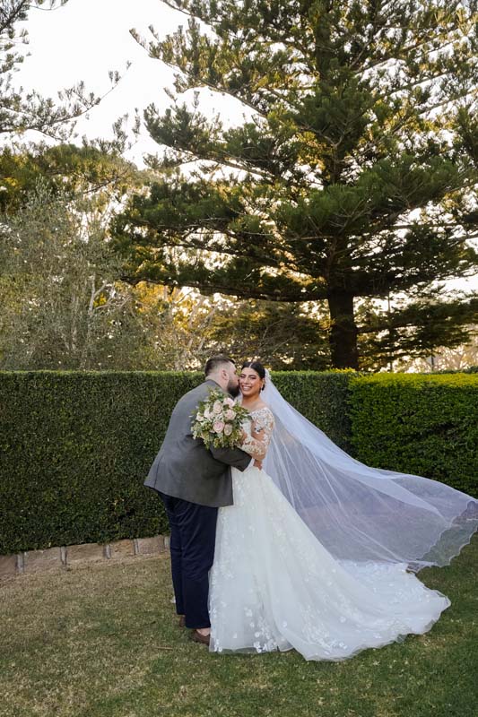 Wedding Photography bride and groom embracing