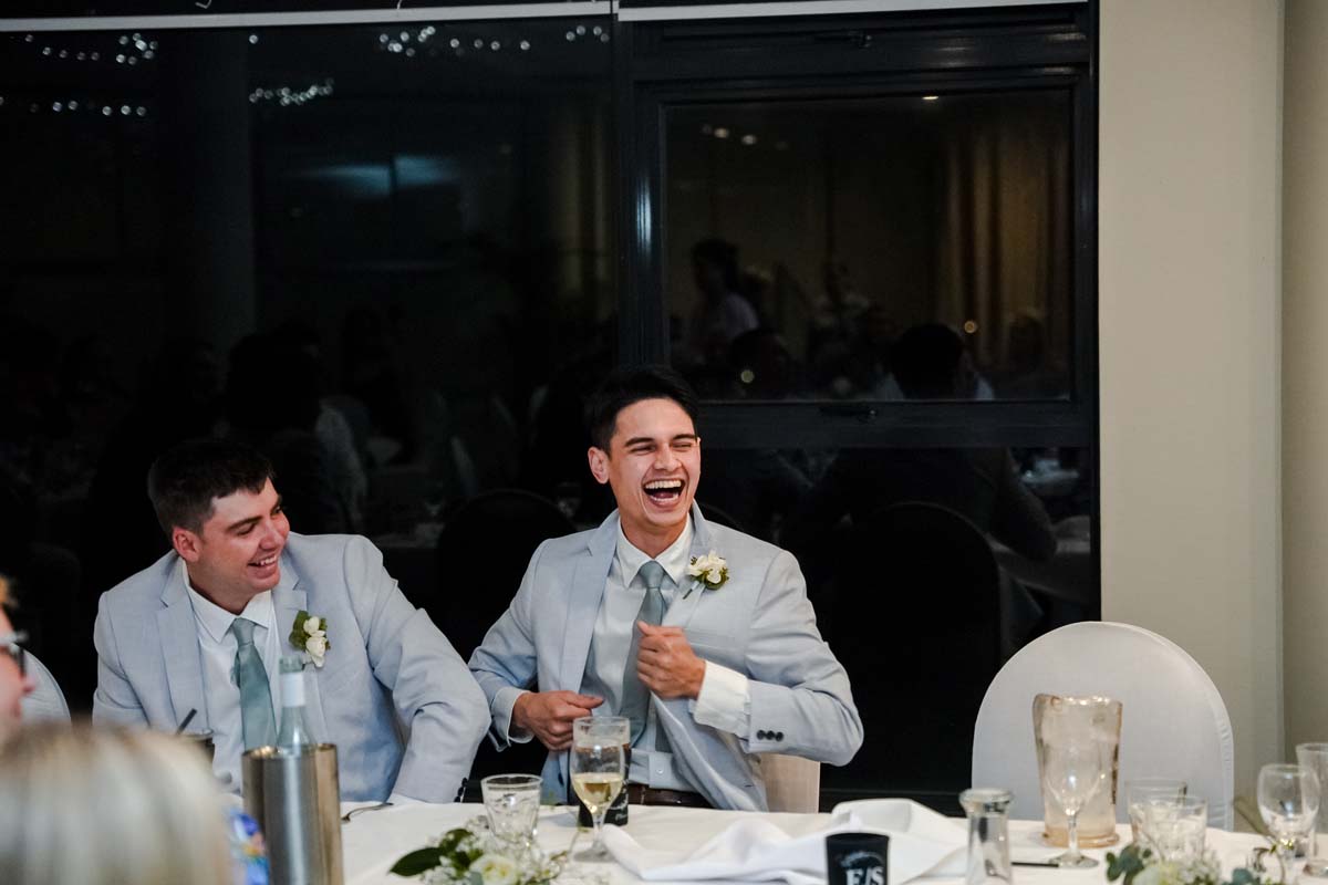 Wedding Photography groomsmen laughing
